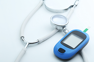 stethoscope and diabetes meter